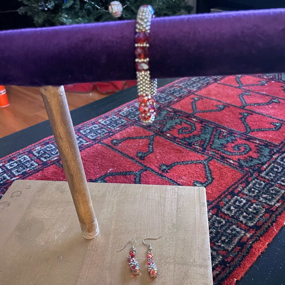 Lovely red and silver tone bracelet and earrings